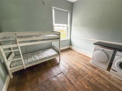 Bedroom Five/Laundry